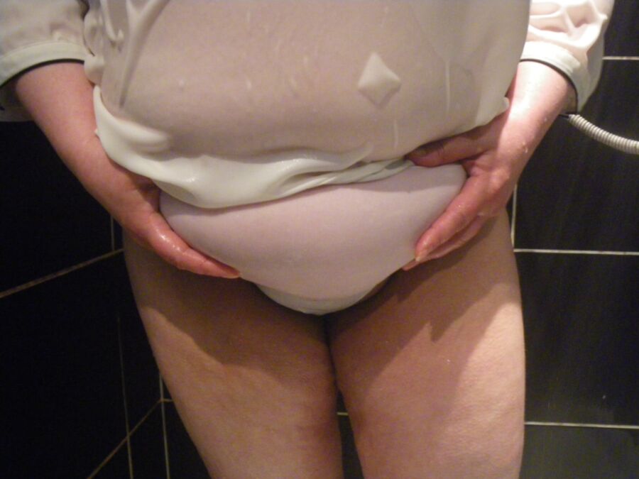 My BBW messing about in the shower, see through