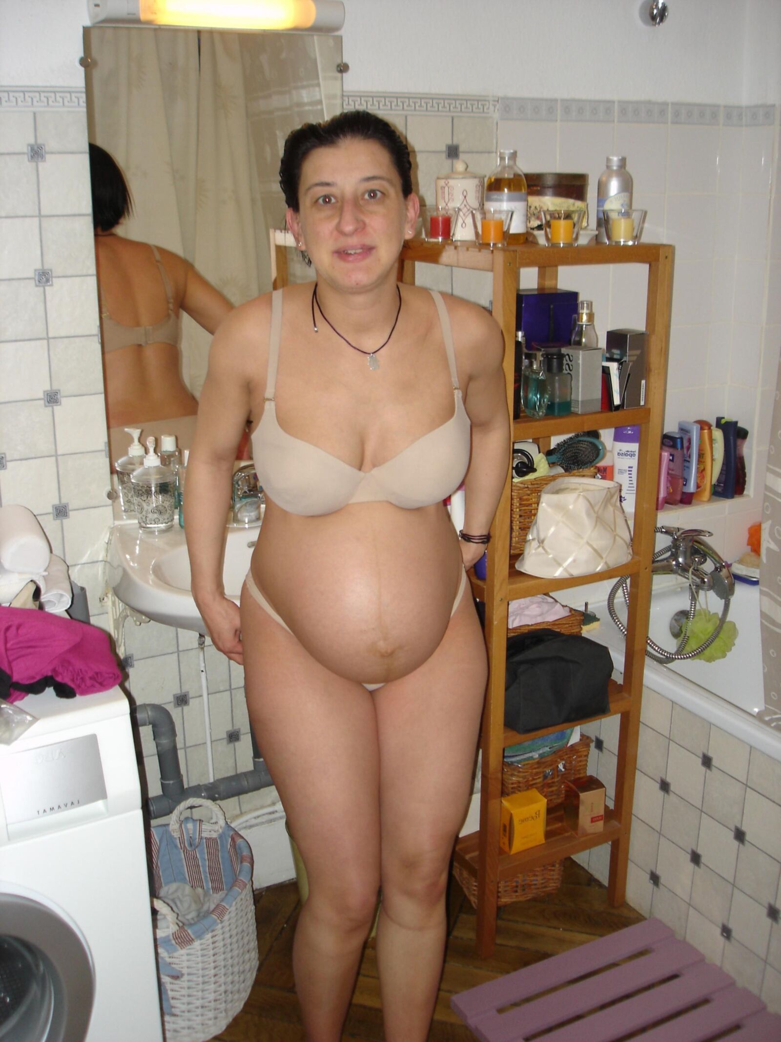 Pregnant woman with big milky tits