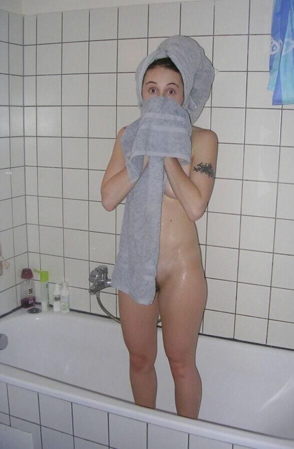 Women and Towels In Shower or Bath On Head