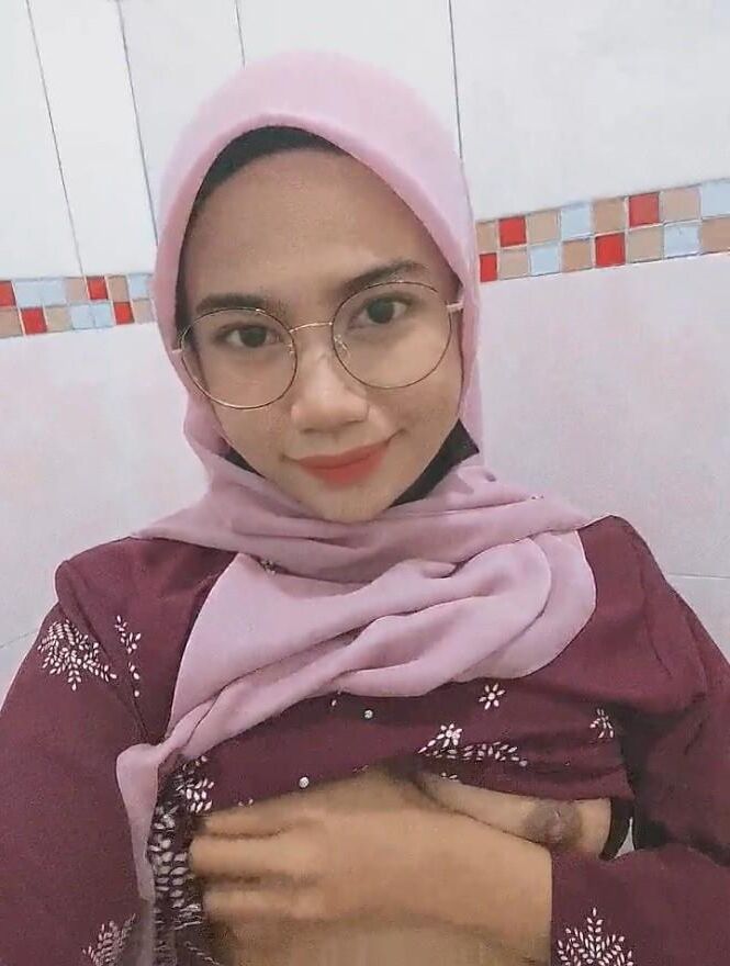 Pretty Asian Hijab Jilbab Showing Her Tits