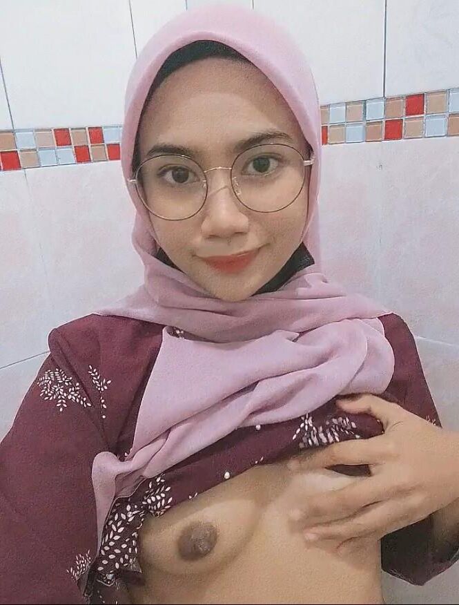 Pretty Asian Hijab Jilbab Showing Her Tits