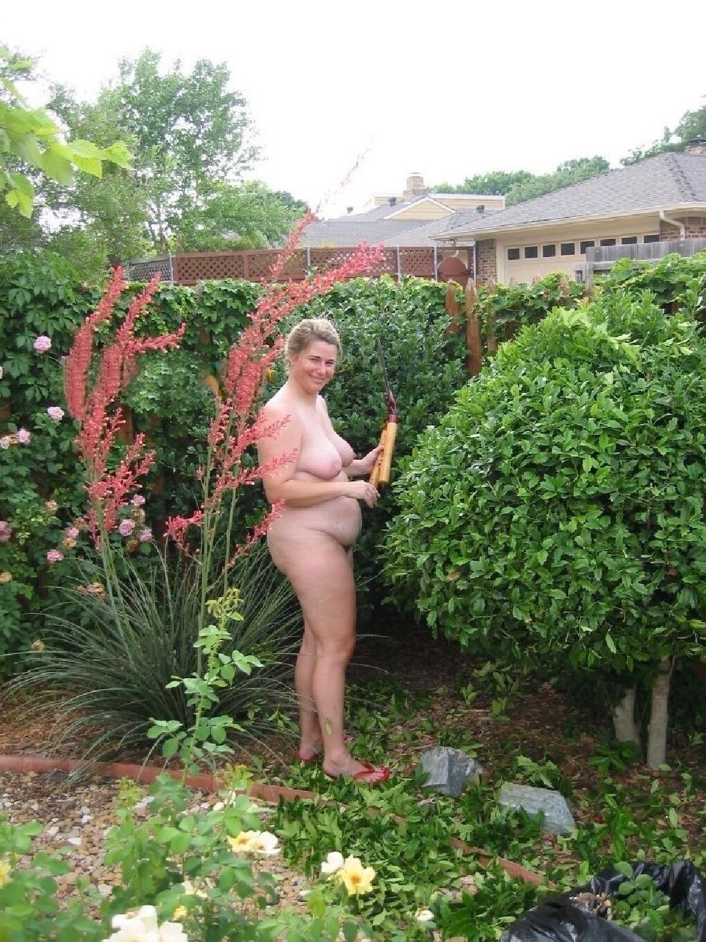 My wife doing yard work 