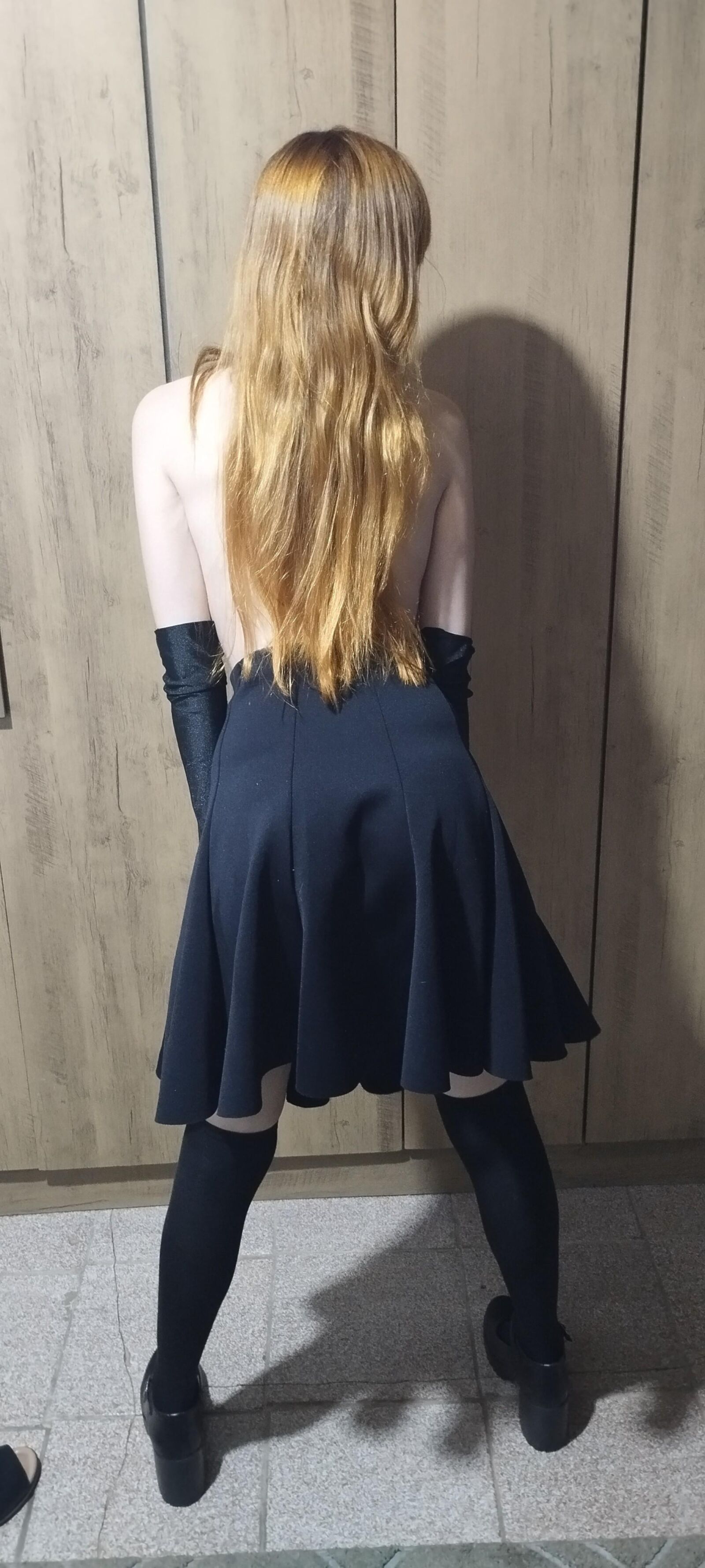 Redhead girlfriend with black skirt