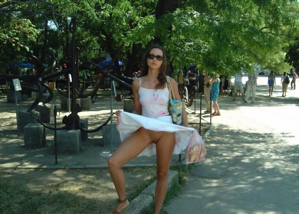 Women Standing Commando Wearing Sunglasses
