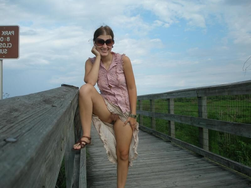 Women Standing Commando Wearing Sunglasses