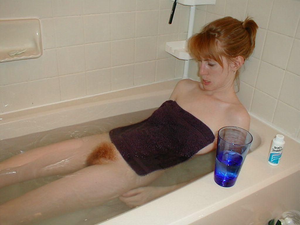 Women in the Bath With a Drink Drink Close By