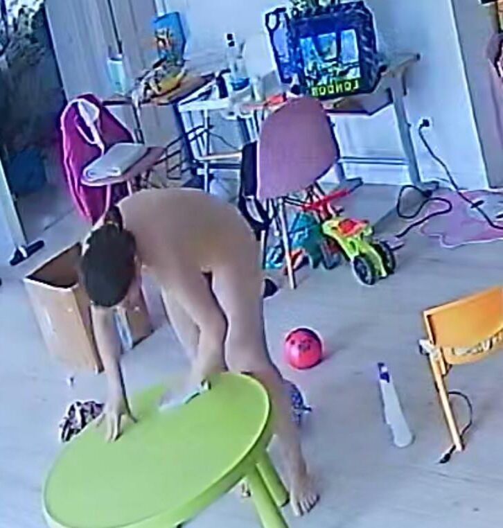 A wife from Bucharest cleans the house
