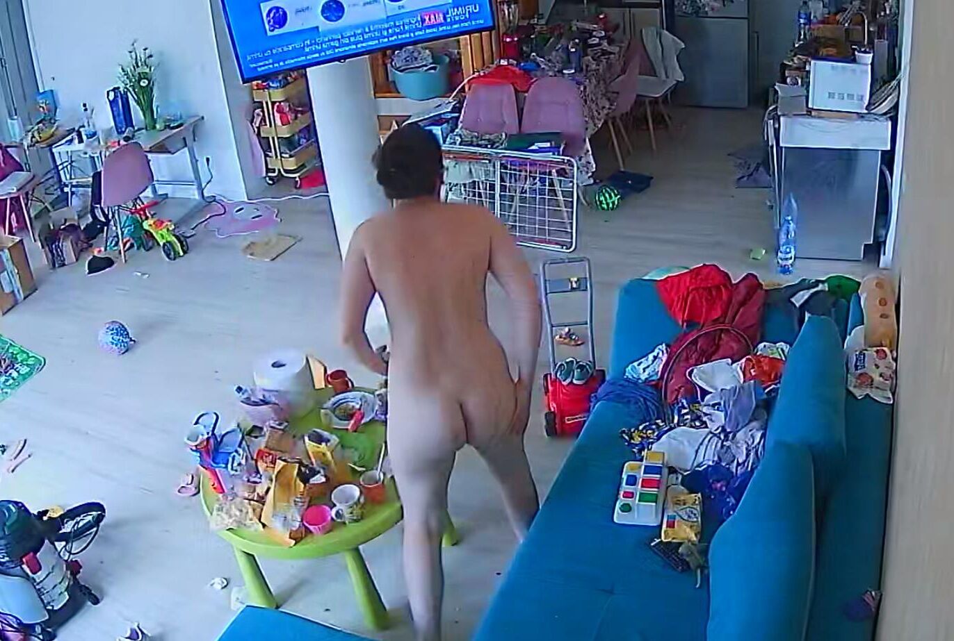 A wife from Bucharest cleans the house