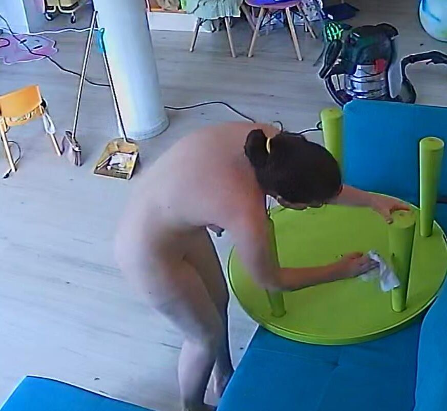 A wife from Bucharest cleans the house