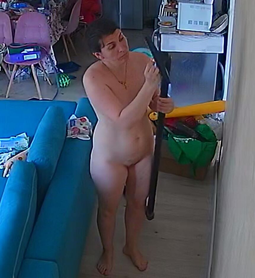 A wife from Bucharest cleans the house