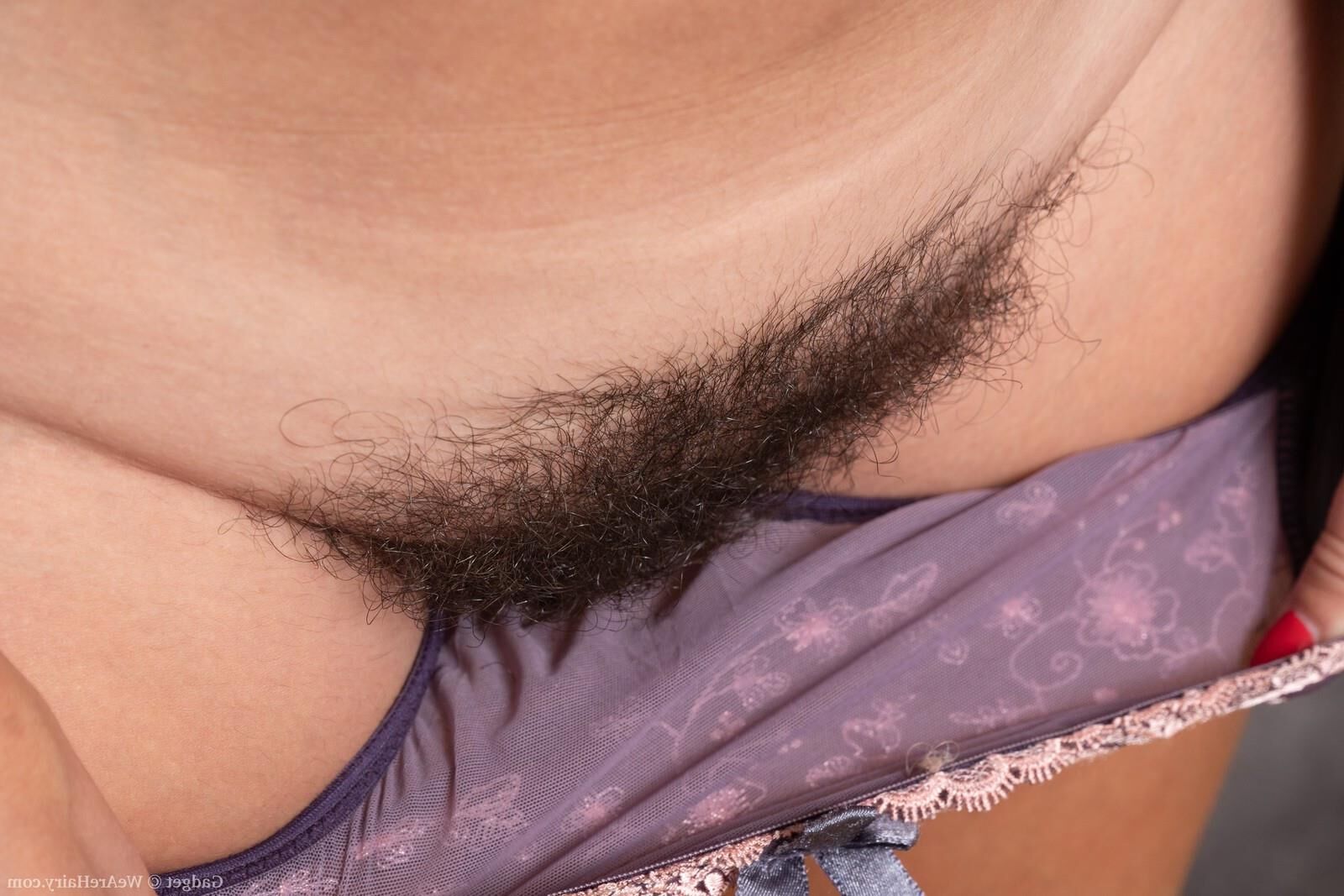 Sexy MILF Strips and Shows Her Big Tits and Hairy Bush