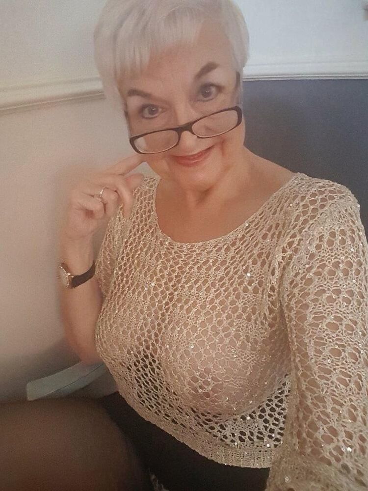 Elegant granny called Jean made some selfies