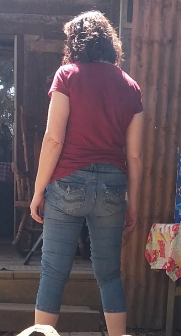 One hot lil ass in tight jeans Damn my wifes got it goin on.