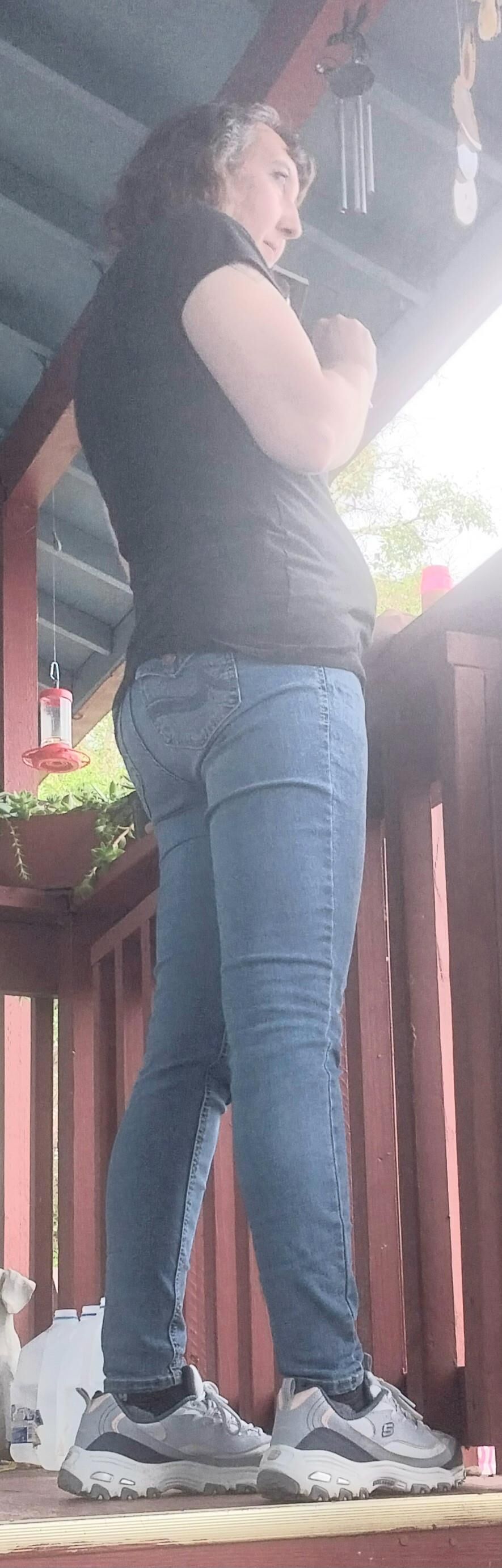 One hot lil ass in tight jeans Damn my wifes got it goin on.