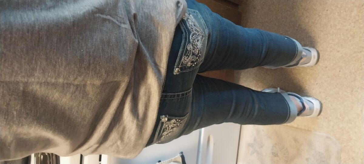One hot lil ass in tight jeans Damn my wifes got it goin on.