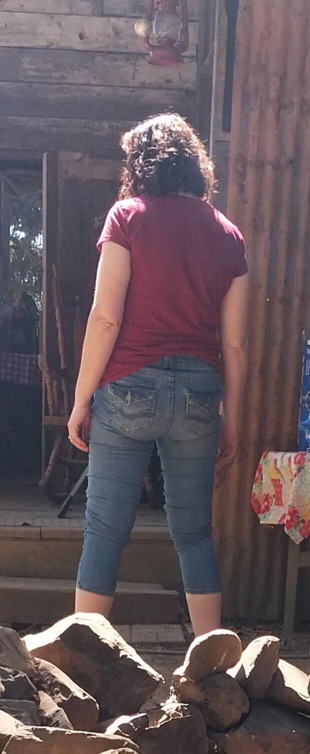 One hot lil ass in tight jeans Damn my wifes got it goin on.