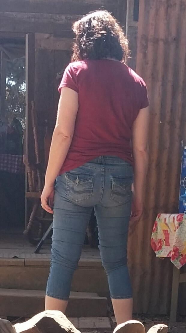 One hot lil ass in tight jeans Damn my wifes got it goin on.