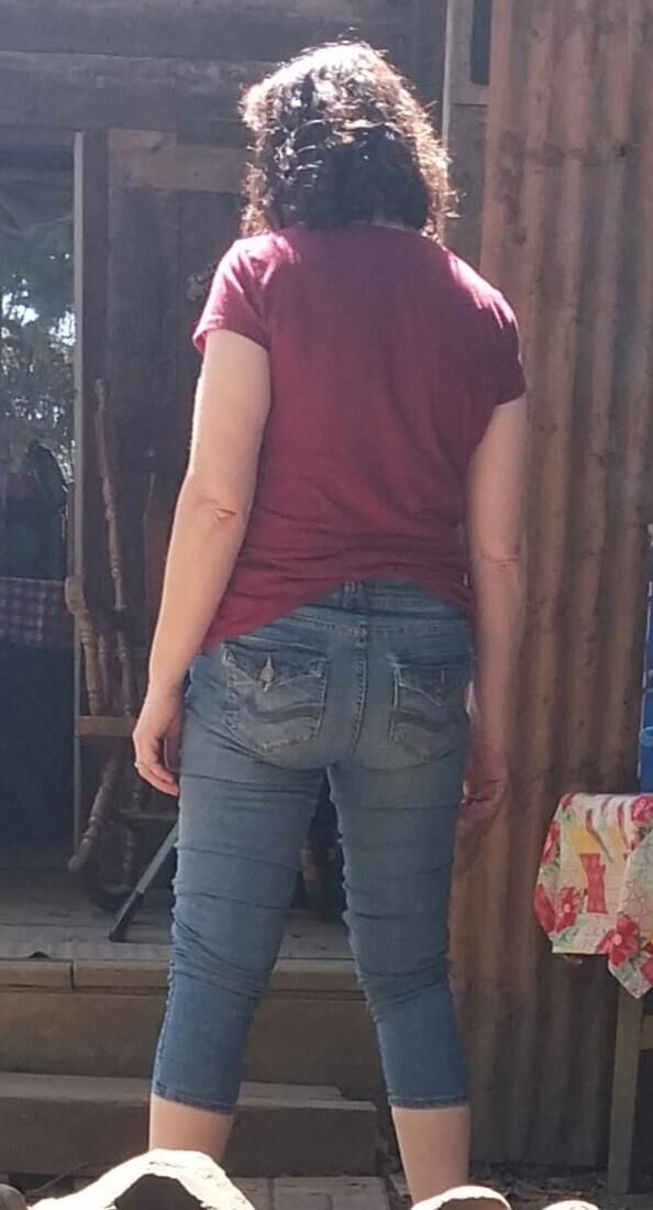 One hot lil ass in tight jeans Damn my wifes got it goin on.