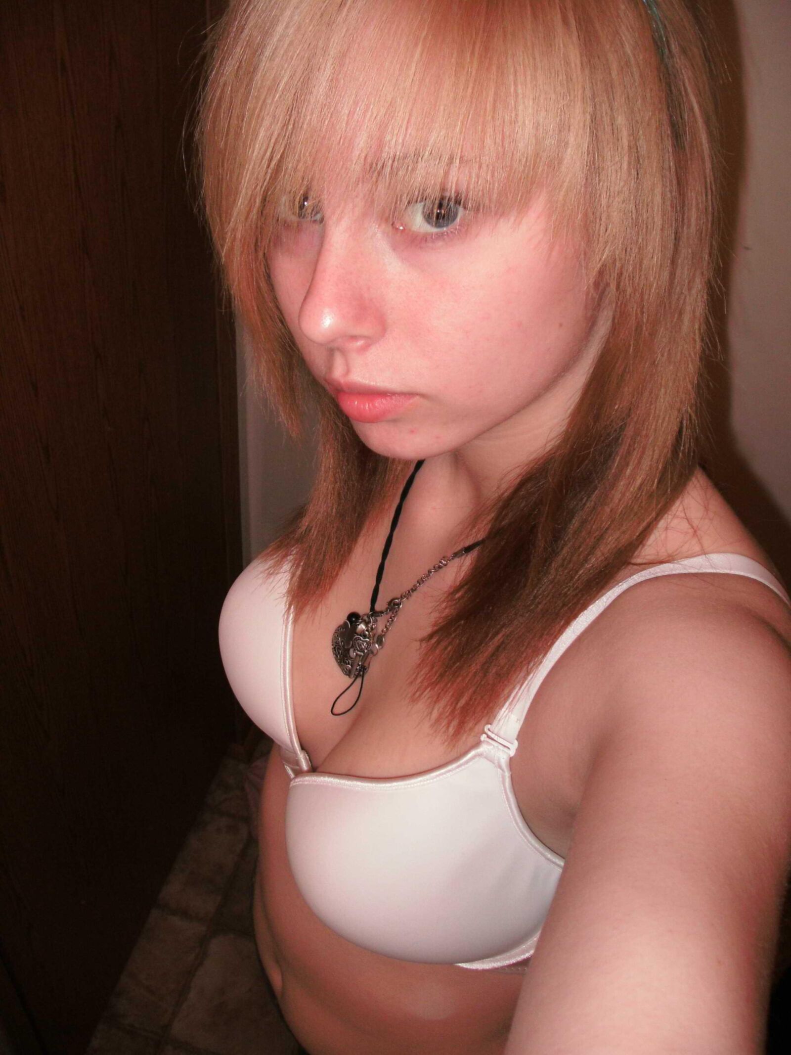 Sexy teen taking selfies in bed