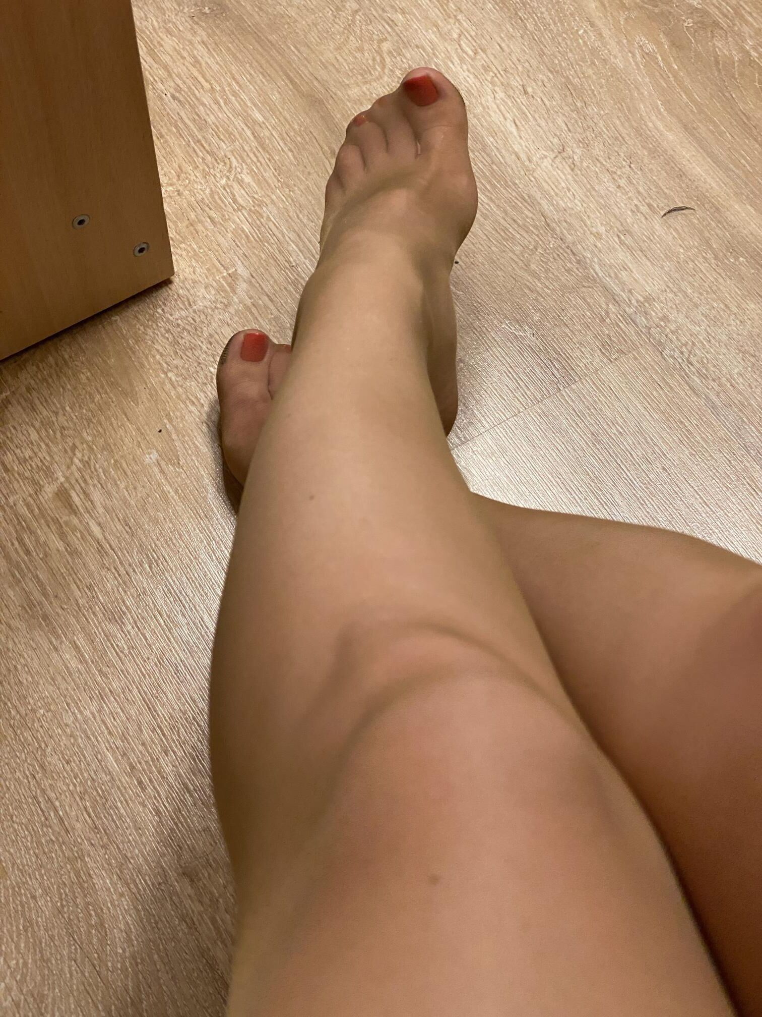 Posing at home in thin pantyhose